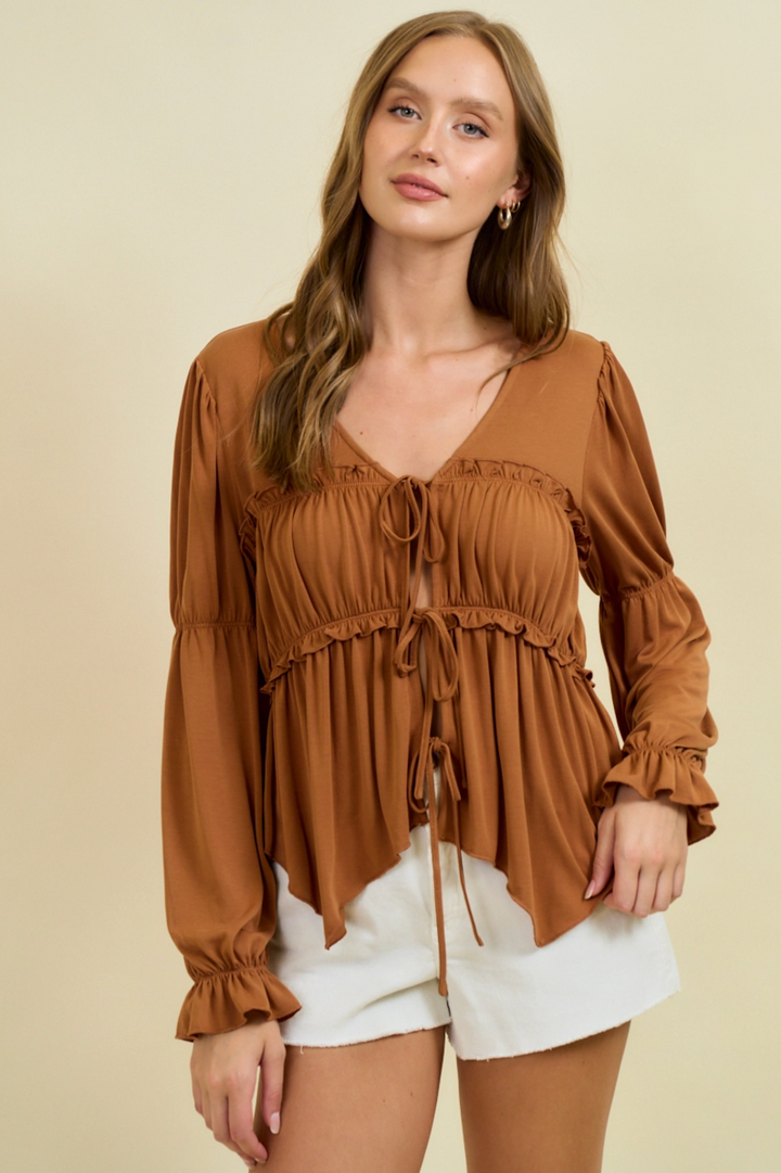 Blusa campesina fruncida de punto modal con lazo frontal