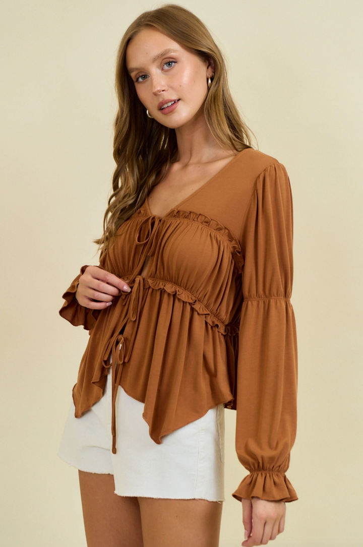 Blusa campesina fruncida de punto modal con lazo frontal